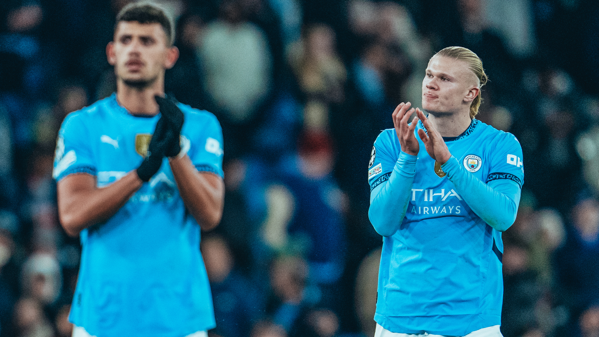 LOYAL SUPPORT: Nunes and Erling Haaland salute the City fans.