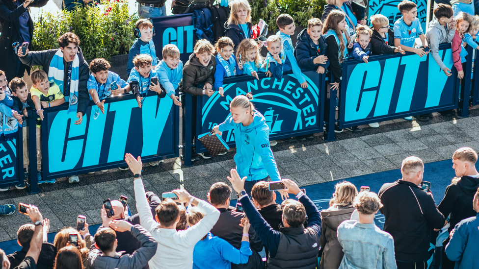 CENTRE OF ATTENTION : Haaland feels the love on his way into the stadium.