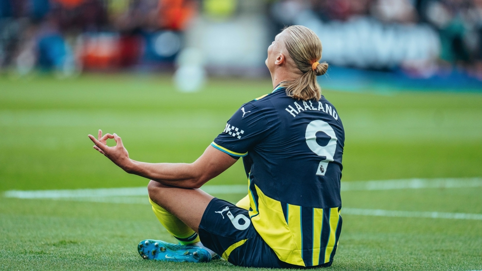 RUN IT BACK : Haaland celebrates in trademark fashion, as he did on his City debut at the London Stadium in 2022.