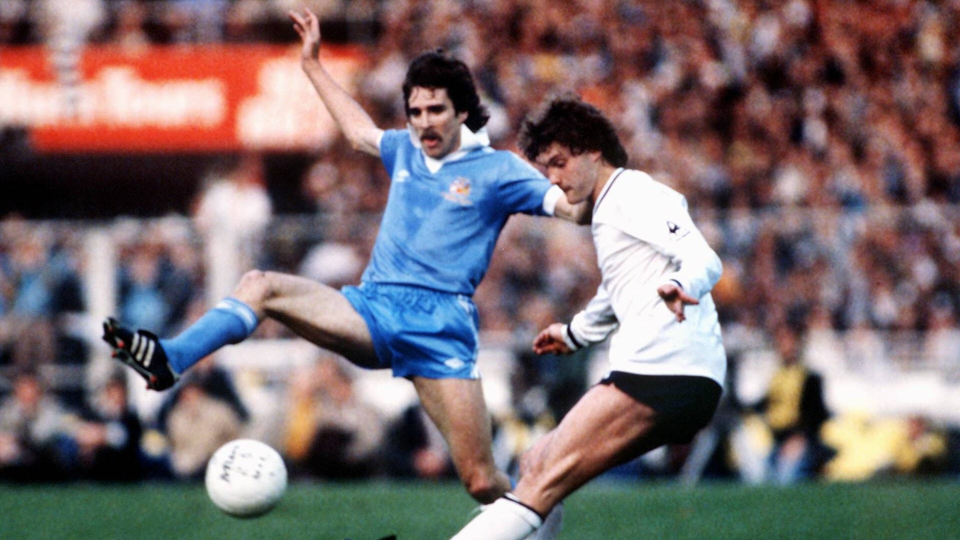 EYES ON THE BALL : Paul Power comes up against Tottenham midfield marvel Glenn Hoddle.