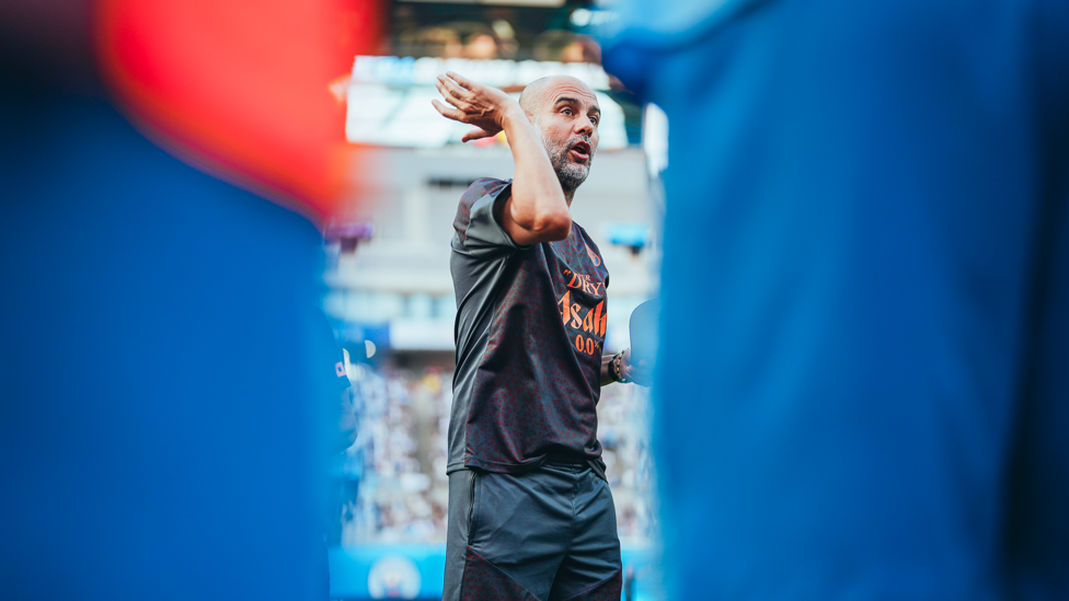 THE BOSS: Pep Guardiola gets his point across to the City players