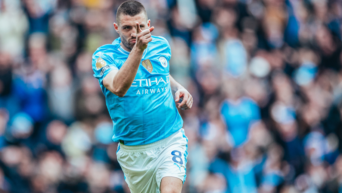 SCREAMER: Kovacic celebrates his wonder goal.