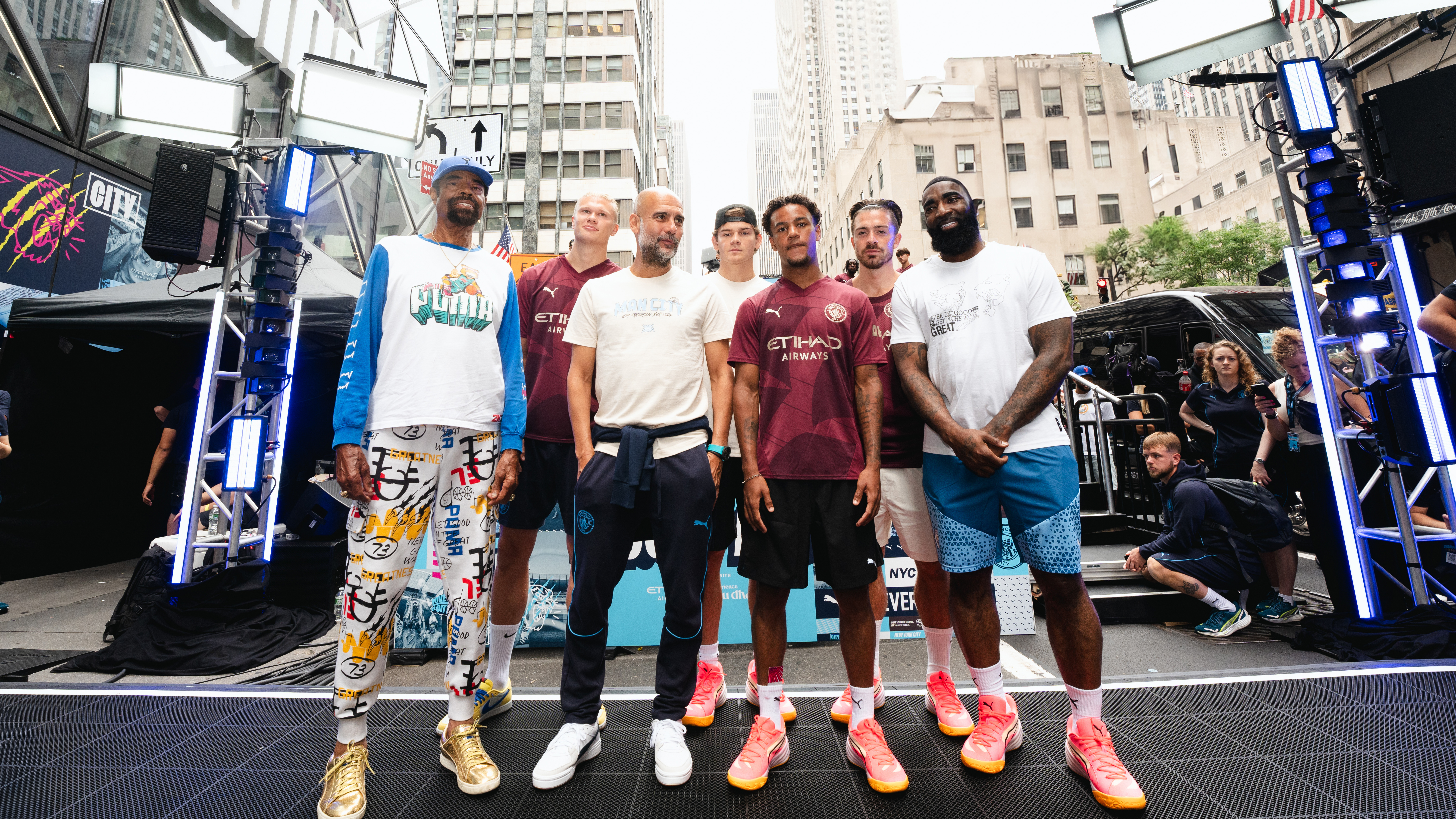 Man City star beam as he plays street basketball in New York in special outfit