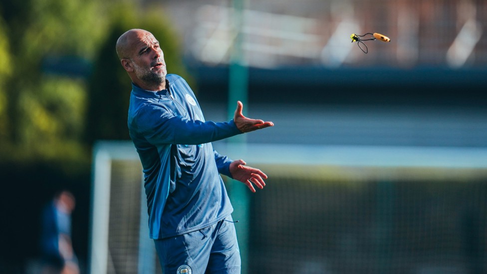 THE BOSS: Pep Guardiola takes a brief moment's break ahead of the next drill.