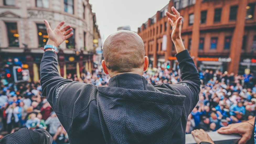 BEST IN THE LAND : Sky blue supporters flock to see Pep and the team on an open bus parade. 