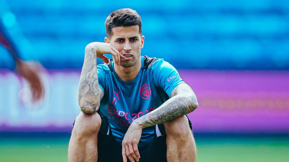 DEEP IN THOUGHT : Joao Cancelo takes a breather.