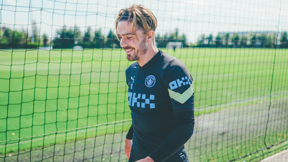 JACK THE LAD : Jack Grealish makes his way out onto the pitch