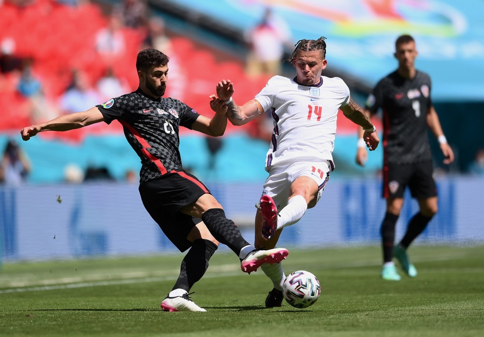  OPPONENTS TURNED TEAMMATES : : Kalvin Phillips and Gvardiol battle it out at Wembley Stadium in June 2021 as both compete for their nation at the Euros -