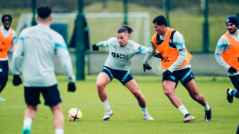 SHIELD  : Phillips fends off attention from Rodrigo to keep the ball