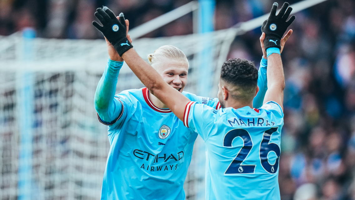 HIGH FIVES: Haaland celebrates with Mahrez.