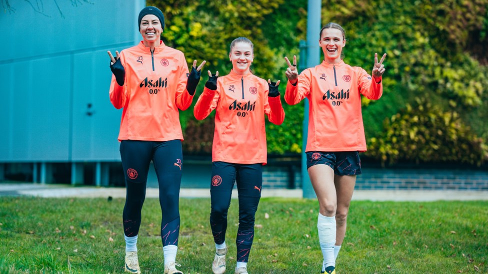 THREE CHEERS: Alanna Kennedy, Jess Park and Kerstin Casperij's expressions summed up the mood in camp.