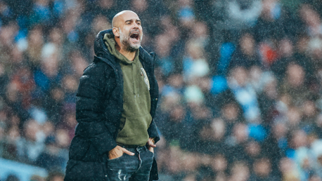 PEP TALK: Passing on instructions from the touchline.