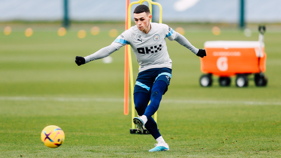 STRIKE : Phil Foden tries his luck