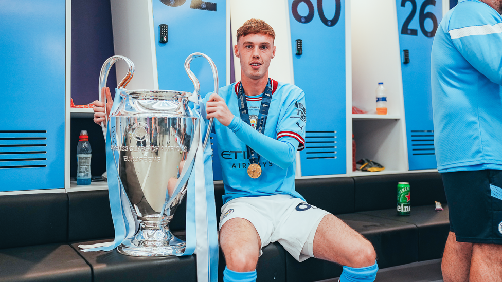 EUROPEAN CHAMPIONS : Palmer sitting with the Club’s first ever Champions League trophy in June 2023. 