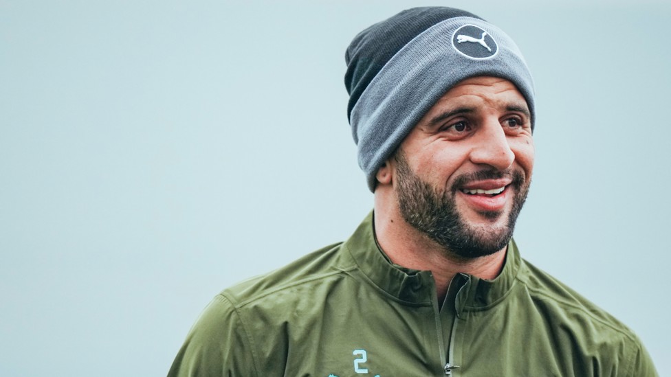 HAT TRICK: Kyle Walker sports some nifty headwear to keep out the November chill.