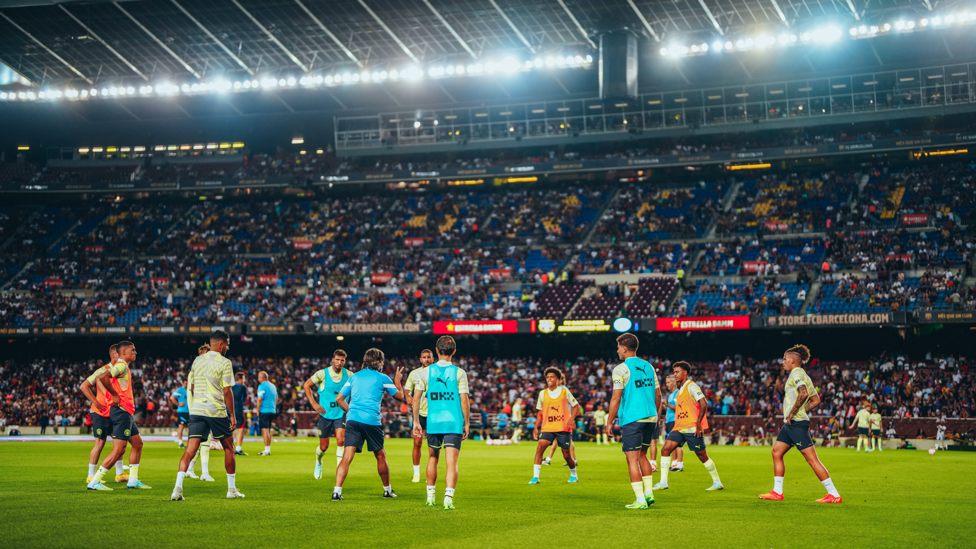 STRETCH TIME : The City lads get their muscles loose during the pre-match warmup.