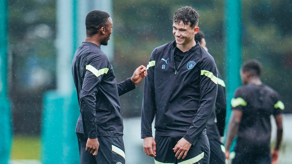 ALL SMILES : Isaac Smith in high spirits in the Manchester weather