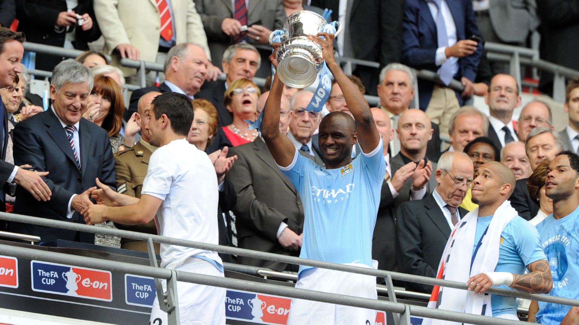 UP FOR THE CUP: Patrick Vieira holds the FA Cup aloft at Wembley after City's 2011 triumph.