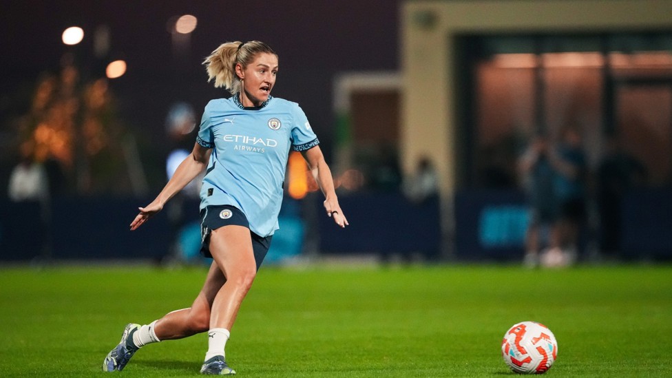 MIDFIELD MAESTRO : Laura Coombs on the ball