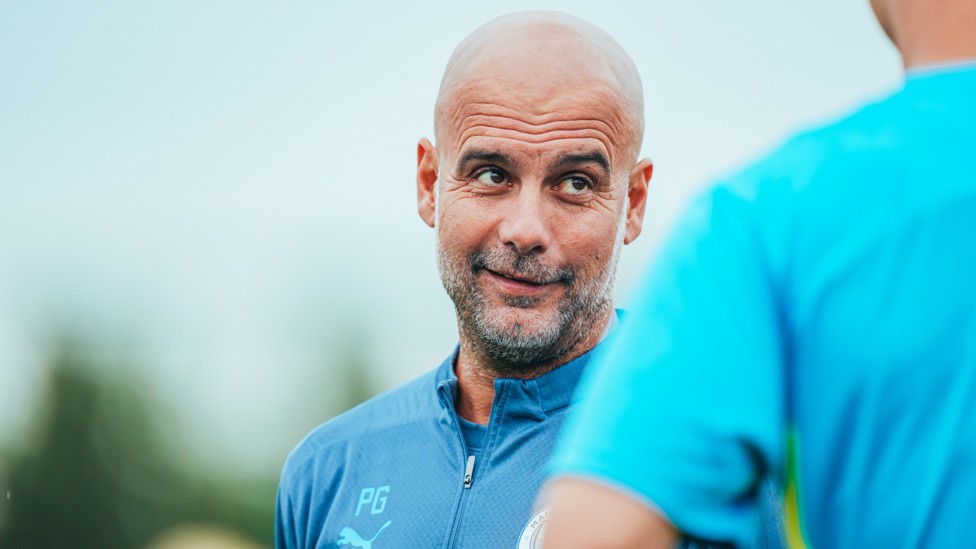 PEP TALK  : Pep Guardiola speaks to his players.