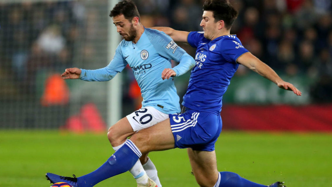 SHADOW PLAY: Bernardo Silva looks to shake off Harry Maguire