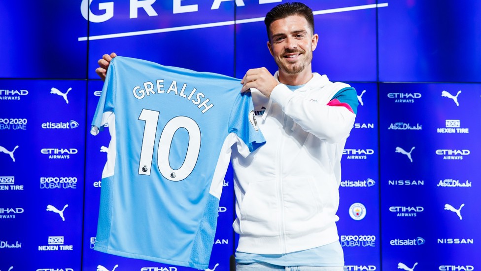 10/10 : Grealish showed off his shirt and number. 