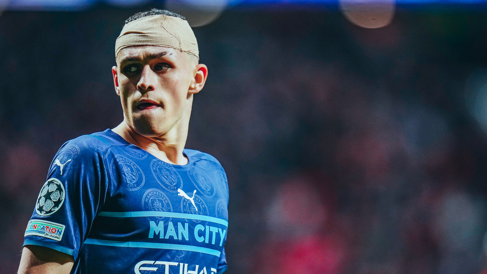 IN A BATTLE : Phil Foden strapped up during the Champions League quarter-final with Atletico Madrid