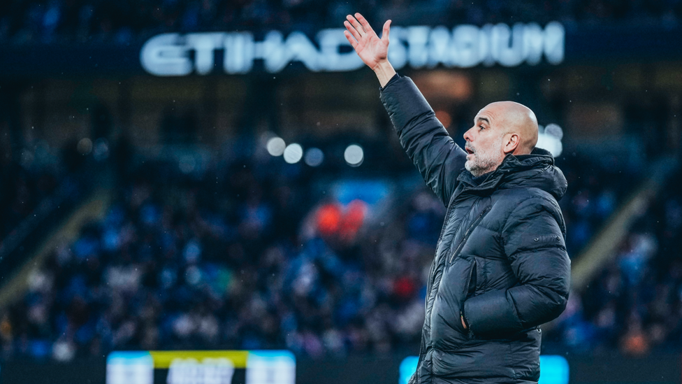 LEADING FROM THE SIDELINES: Pep Guardiola guiding his players from the touchline