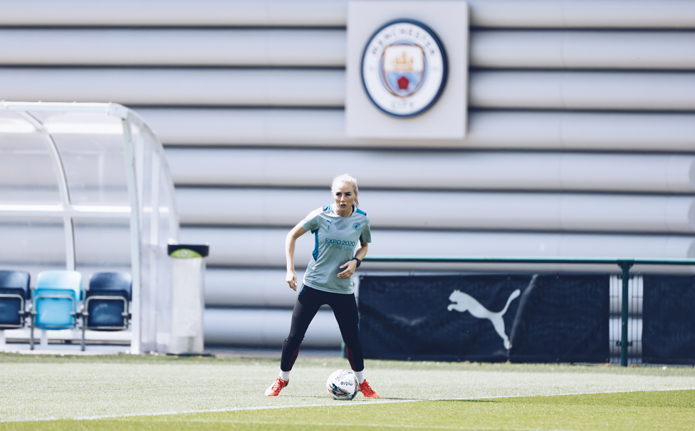 DEFENSIVE WALL : Alex Greenwood on the ball during a practice match