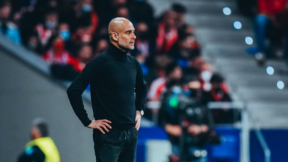 WATCHING ON : Pep looks on as we hold firm against a bout of Atletico pressure.