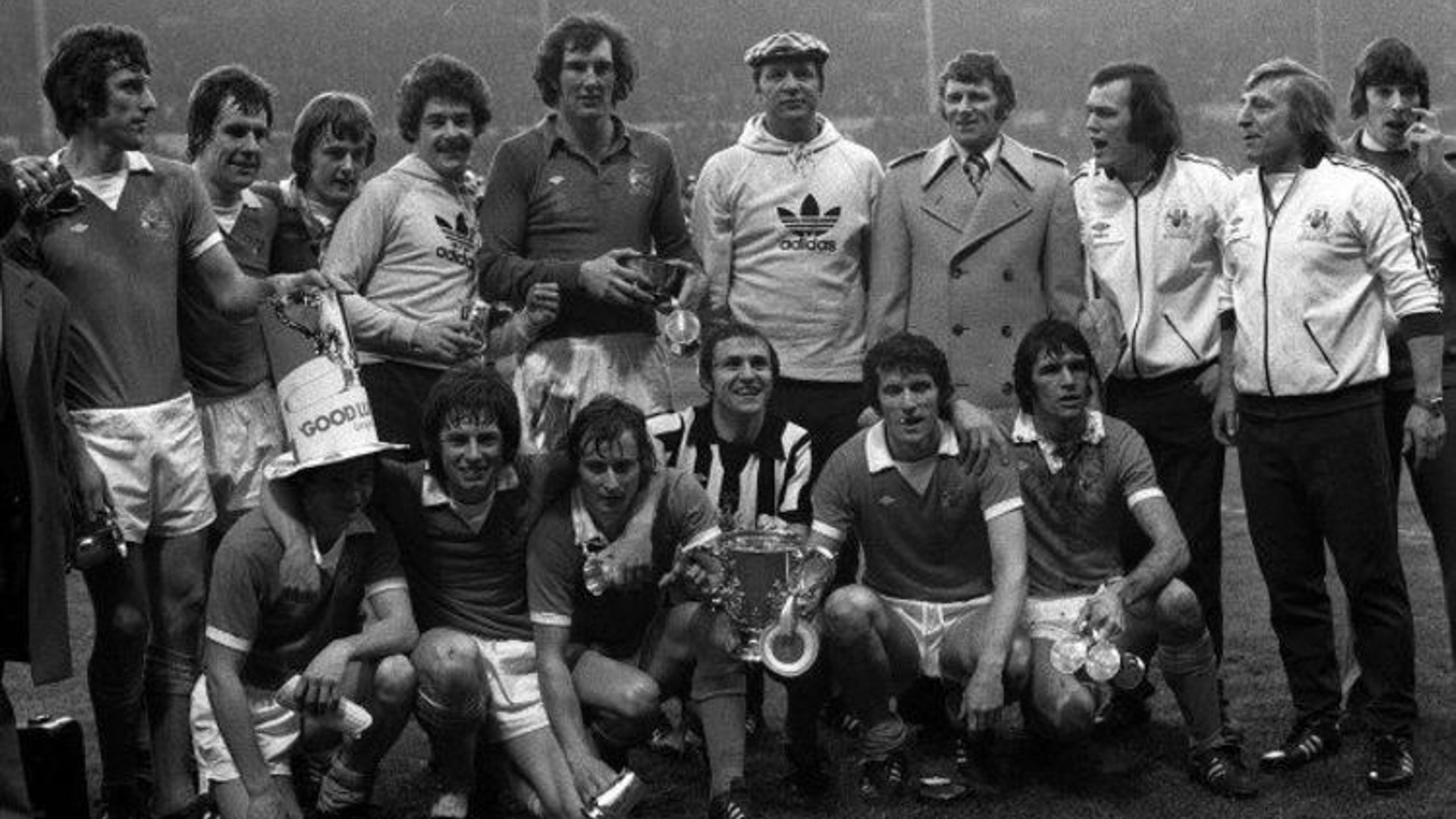 WEMBLEY JOY: Peter Barnes, Tommy Booth and City celebrate our 1976 League Cup final triumph.