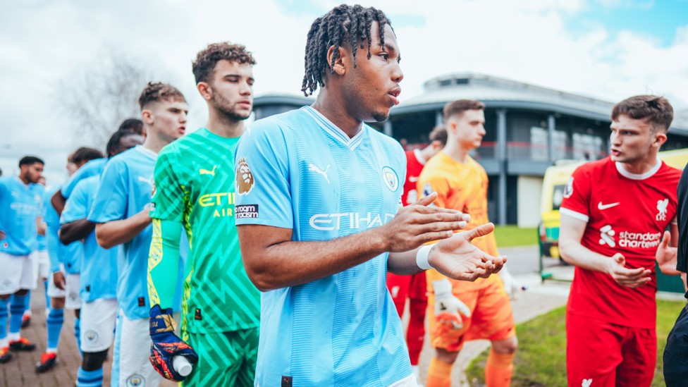 LEADING BY EXAMPLE : Micah Hamilton gees the players up as the EDS head out for their away clash at Liverpool