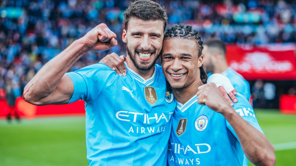 DEFENSIVE DUO : Dias and Ake celebrate!