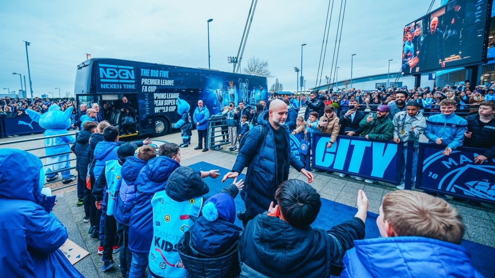 WELCOME PEP: The boss is greeted by the City supporters