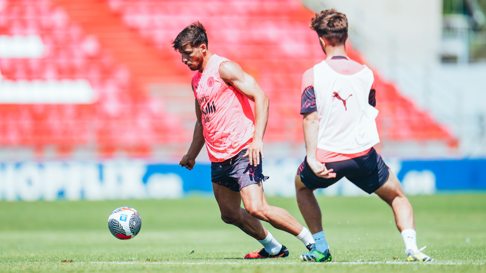 DEFENSIVE DUO : Ruben Dias and John Stones tussle for the ball