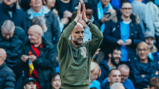 SETBACK: The boss applauds his team on after Brighton make it 2-1.