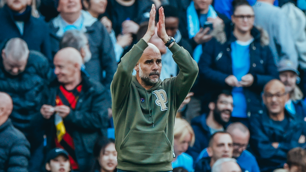 SETBACK : The boss applauds his team on after the visitors pull a goal back through Leandro Trossard.