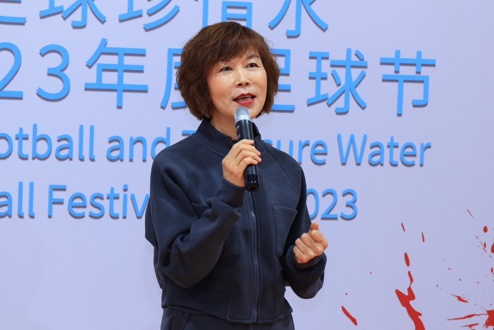 3 : Ms. Shuping Lu, CEO of Xylem China, addresses attendees of the community football festival