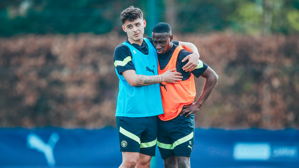 FRIENDLY RIVALRY : Alex Robertson consoles Carlos Borges during training
