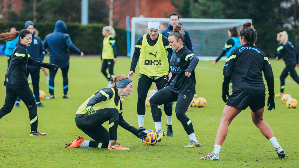 HANDBALL? : Sandy MacIver uses her goalkeeping instincts to win the ball