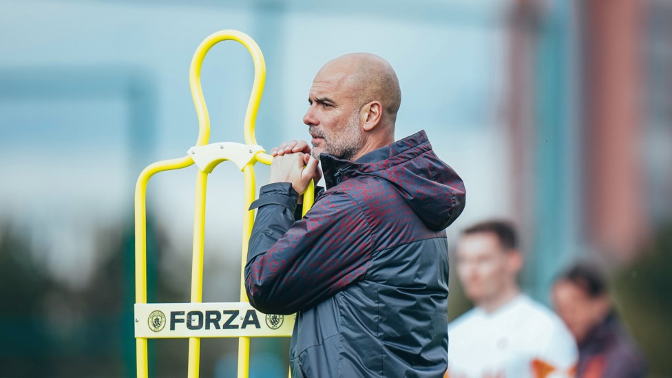 FOCUSED : Pep Guardiola watches his team train.