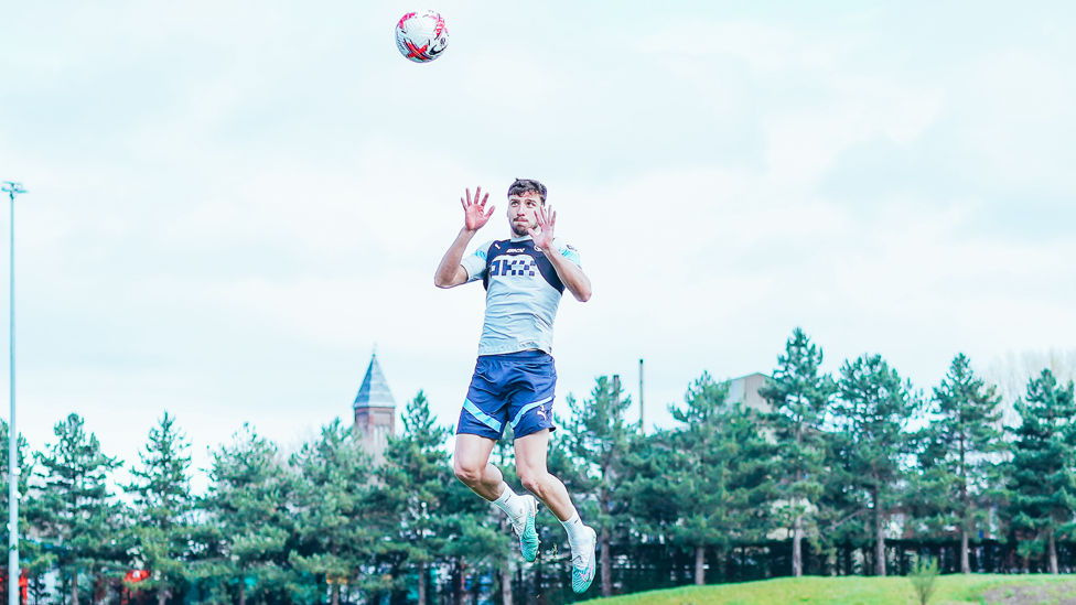 JUMP UP : Ruben Dias leaps to make a header