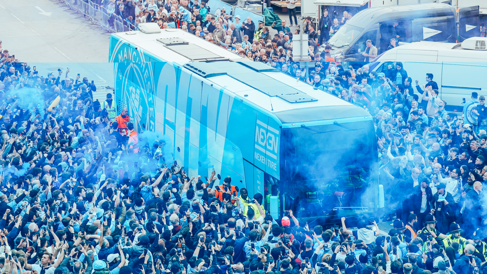 LET THEM THROUGH! : The City team arrive outside the stadium to a sea of fans.