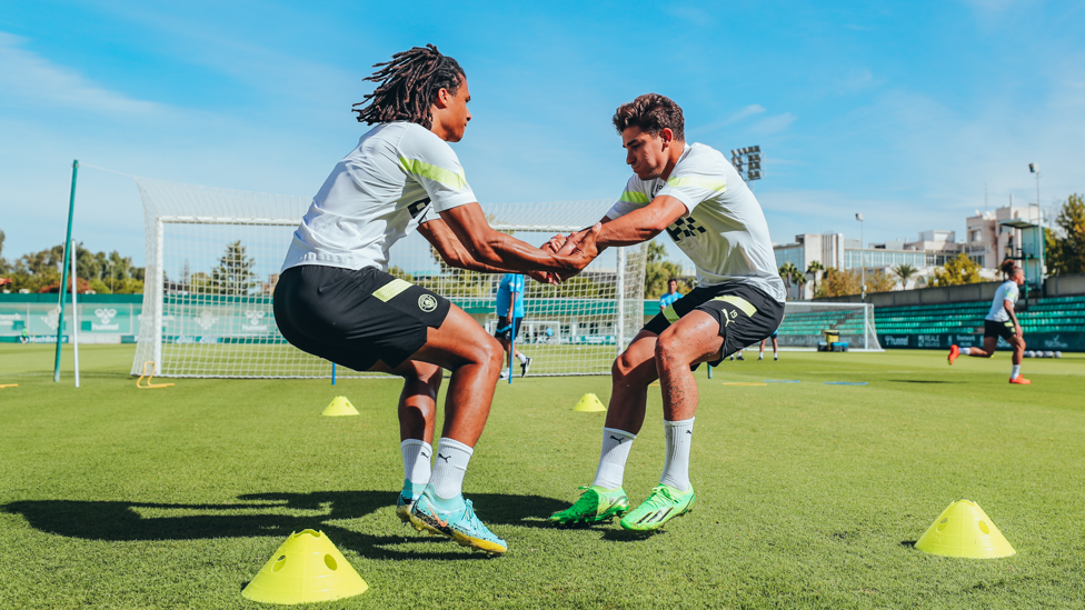 FITNESS DRILL: : Nathan Ake and Julian Alvarez work on another special routine