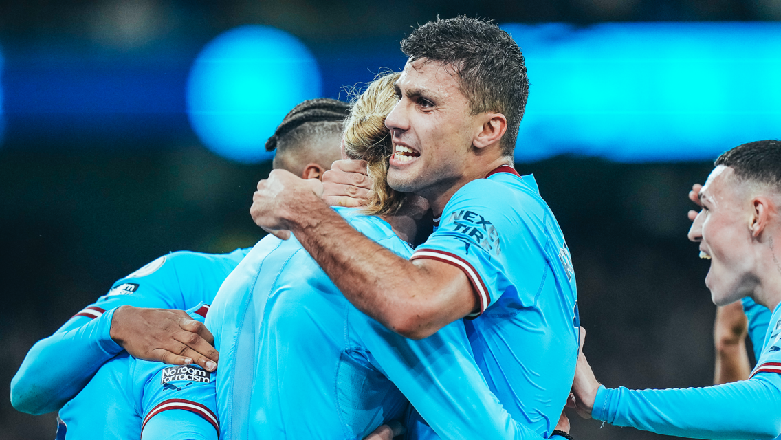 MOBBED: Rodri celebrates with Haaland.