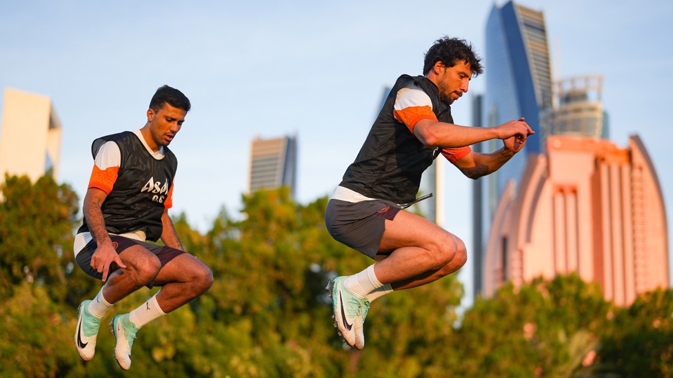 For the high jump! Rodrigo and Ruben Dias take the leap