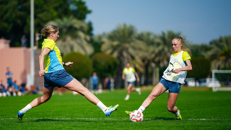 TWINKLE TOES : Laura Blindkilde Brown tries to dribble away from Rebecca Knaak