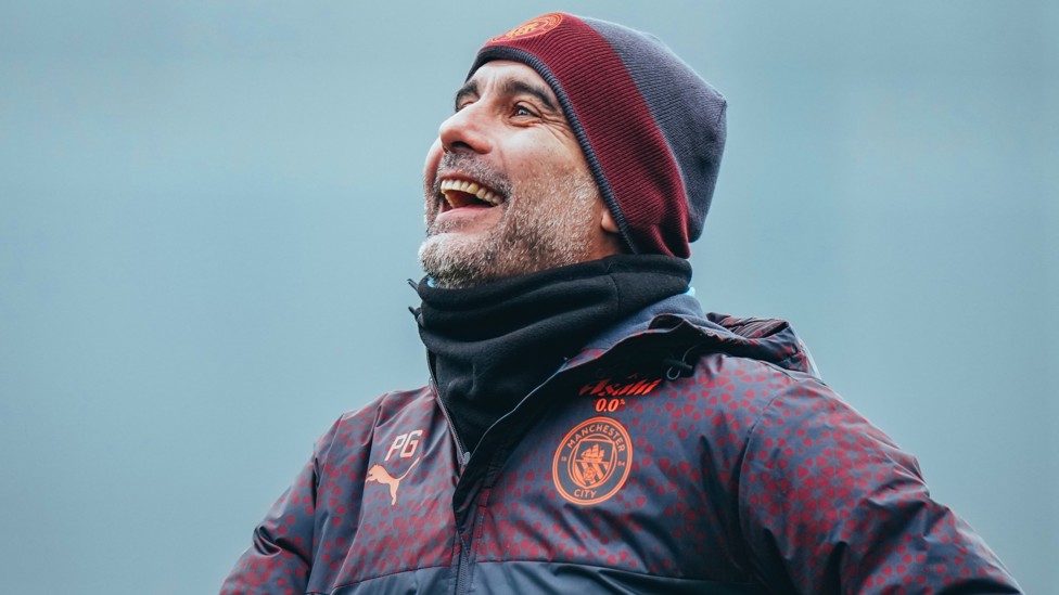 BOSSING IT : Pep Guardiola in high mood ahead of our latest UCL assignment 