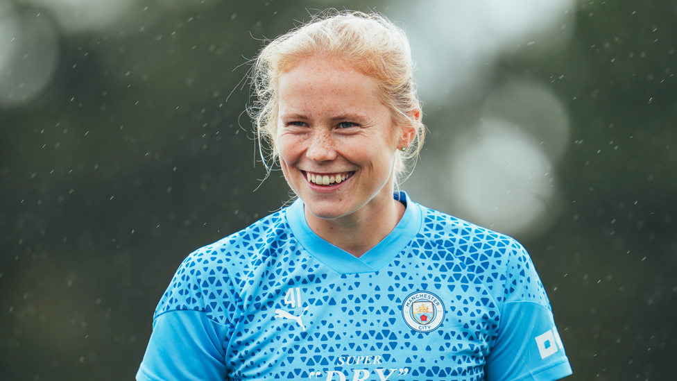 BEAMING BLAKSTAD  : Midfielder Julie Blakstad is in high spirits