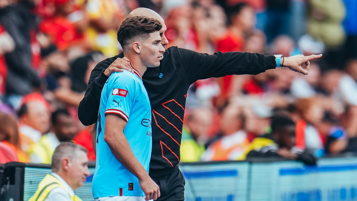 DEBUT: Alvarez gets final instructions from Guardiola.